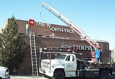 Installation of a sign for The North Face